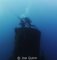 Divers beginning ascent from smoke stack, USS Duane, Key ... by Joe Quinn 